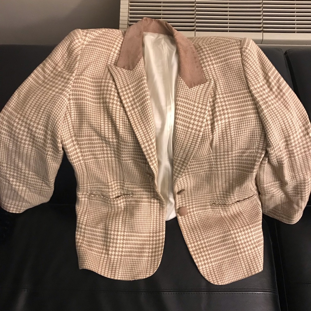 Women’s size 12 Blazer. Fits like a medium.